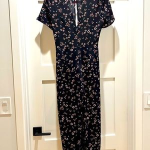 Short sleeve, navy blue and floral wide legged pants romper